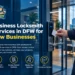 Business locksmith using an electronic access lock at a modern DFW office building.